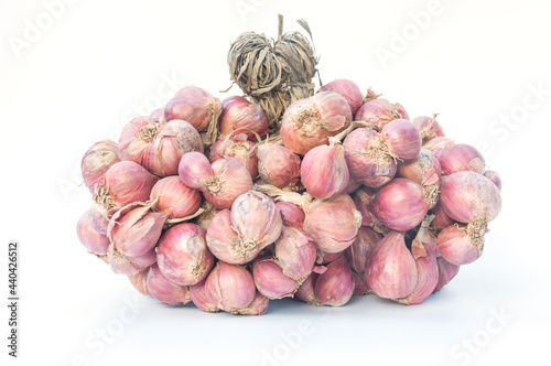 Shallot onions in a group isolated on a white background
.Shallots are ingredients in Thai curry.Shallots are Thai food and Thai herbs.