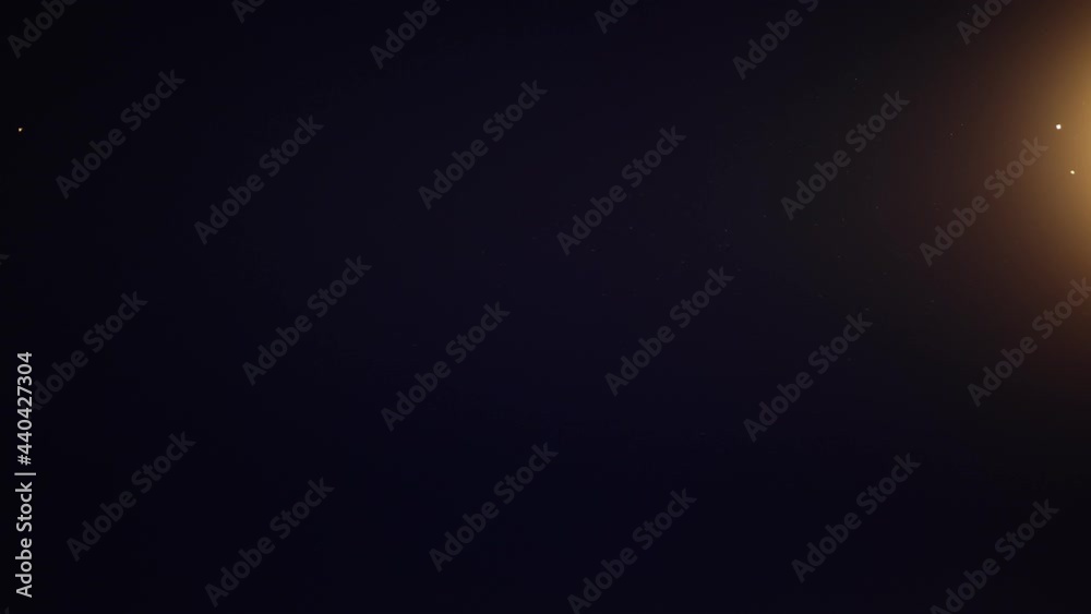 Close Up of Flood Lights with Bugs Swarming Around at Night - Shallow Depth of Field - Slow Motion Close Up of Flood Lights with Bugs Swarming Around at Night - Shallow Depth of Field - Slow Motion