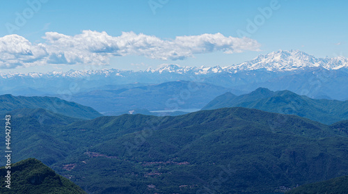 layers of mountains, view from Monte Generoso to the Swiss with snow on the top in summer © Simona