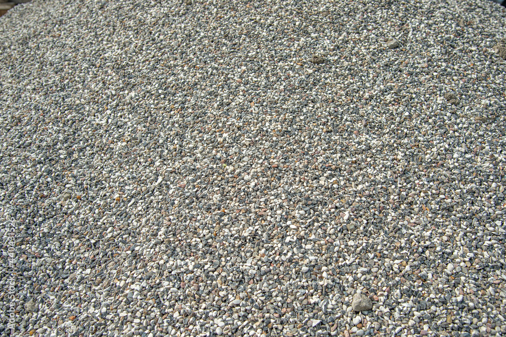 Here pebble gravel, to a construction site Here pebble gravel, to a construction site