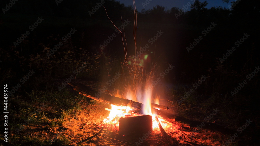 Night tourist campfire in a forest glade. Night tourist campfire in a forest glade.