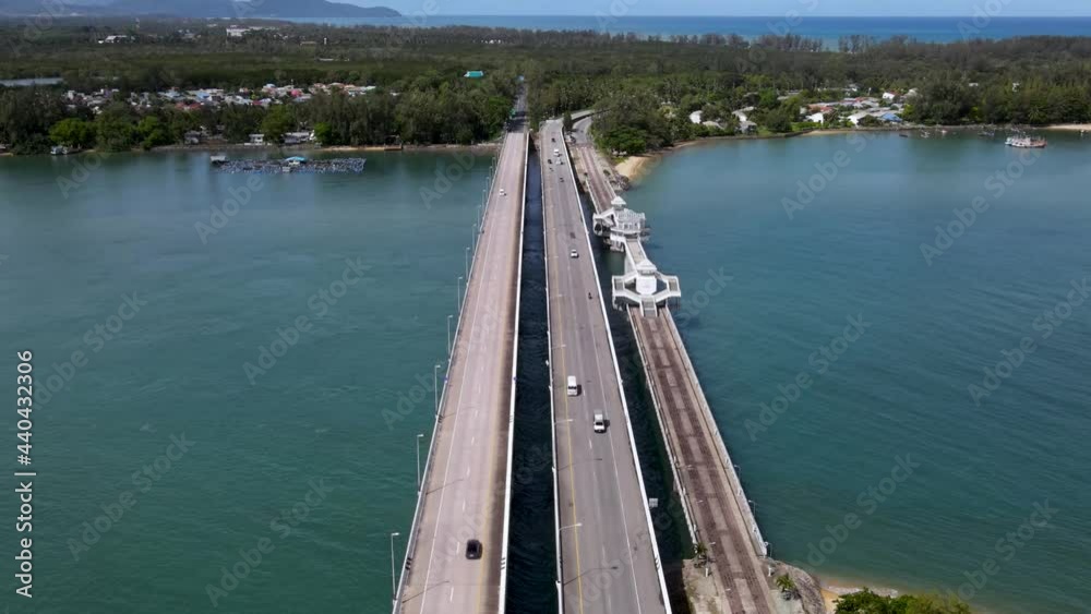 Aerial view of The Sarasin bridge is historic bridge and The entrance gate of Phuket province, Phuket Island - 14 june 2021 Aerial view of The Sarasin bridge is historic bridge and The entrance gate of Phuket province, Phuket Island - 14 june 2021