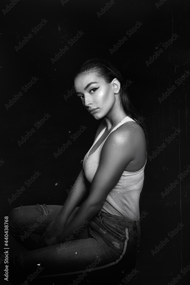 Black and white studio portrait of a girl