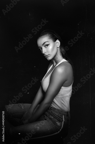 Black and white studio portrait of a girl