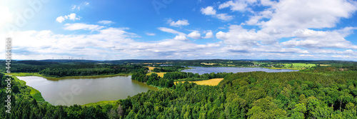 the westerwald forest with the dreifelder weiher lake in germany panorama