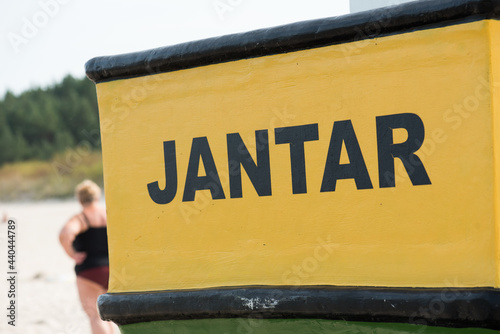 Inscription 'Jantar' on the wooden fishing boat, Poland.