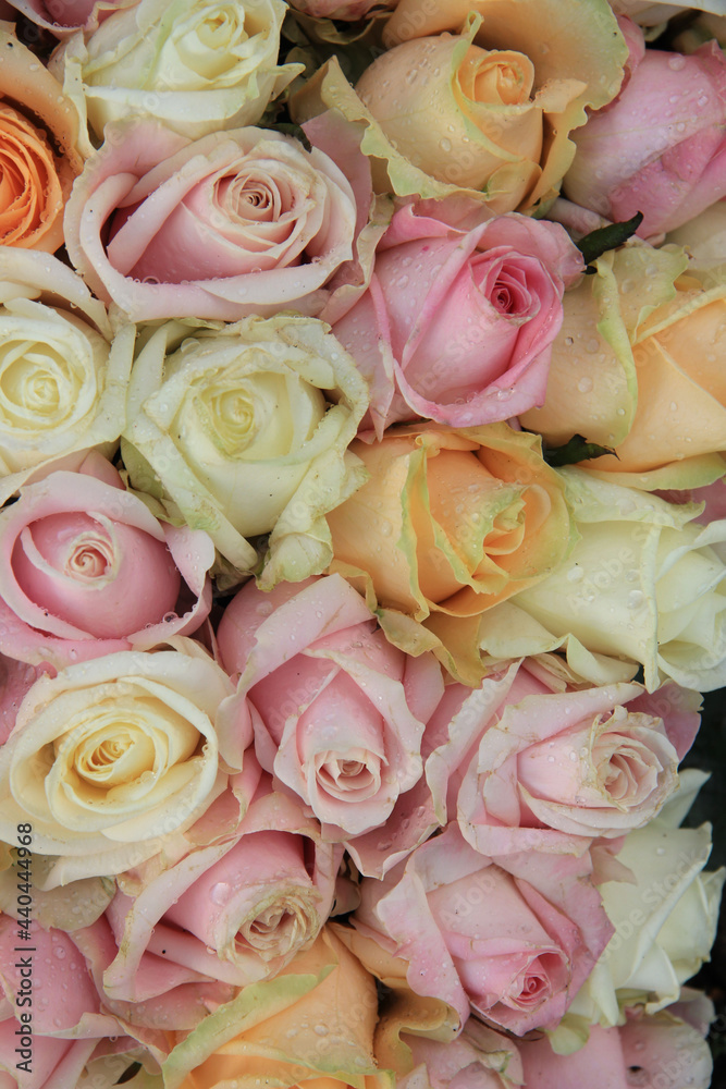 Pastel roses in a wedding arrangement