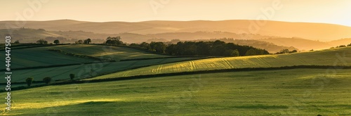 Sunset over fields in Berry Pomeroy Village, Devon, England, Europe