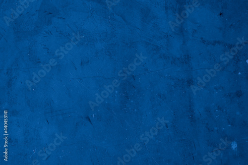 Old wall pattern texture cement blue dark abstract  blue color design are light with black gradient background. © Kamjana