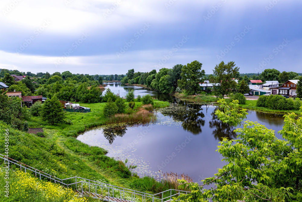 Countryside landscape with river in summer