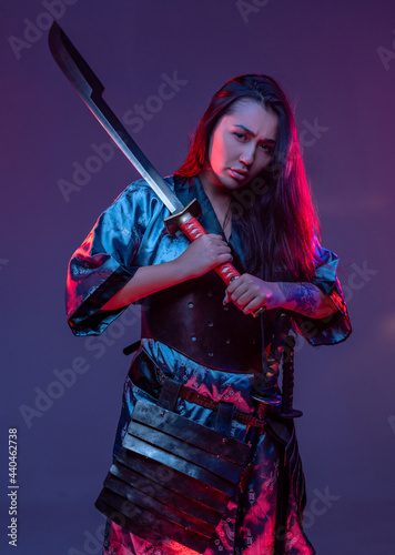 Female assassin from east in kimono with katana