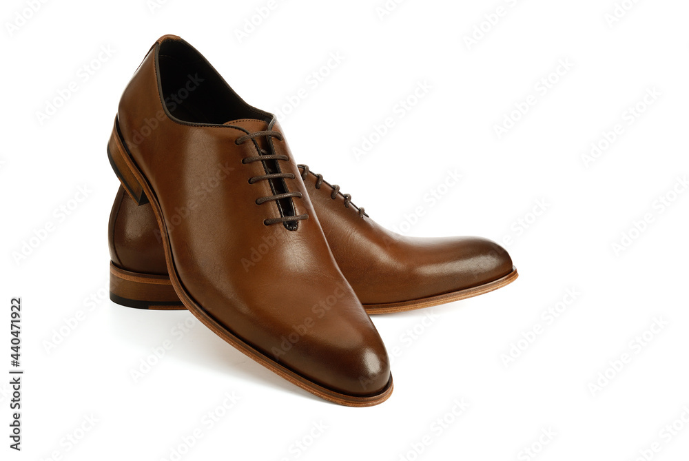 Men's brown oxford fashion shoes isolated on a white background. Men's brown oxford fashion shoes isolated on a white background.