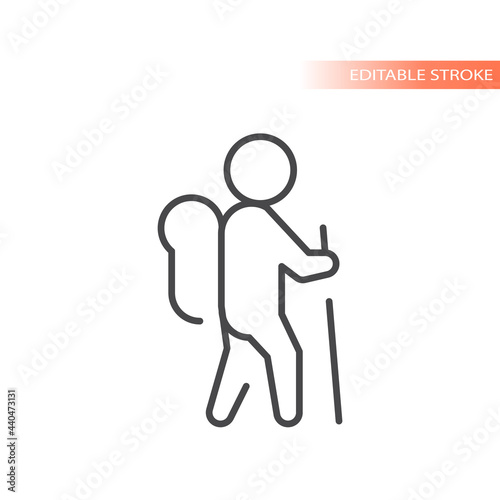 Hiker with hiking poles and backpack icon. Tourist line vector symbol, editable stroke.
