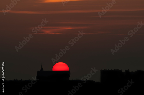 Sunset over the city. Poland Bialystok. The photo was taken against the sun