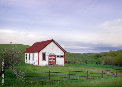 A small historic schoolhouse in Montana photo