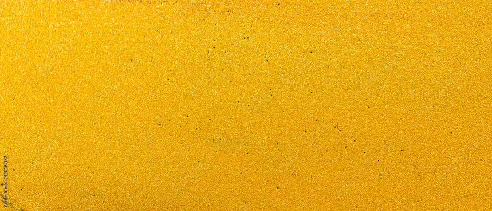 Fototapeta premium Gold glitter abstract background. Golden textured surface. Minimalism