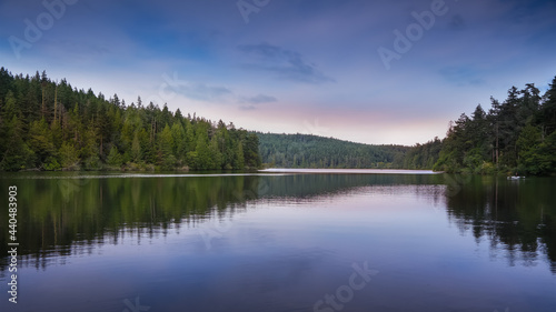 Panoramic view of Pass lake landscape in twilight with perfect reflections