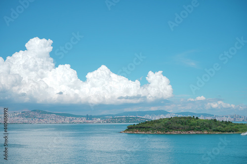 Photography A view from Burgazada to Istanbul with amazing clouds and  an Island