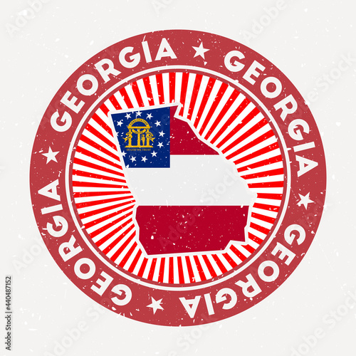 Georgia round stamp. Logo of US state with state flag. Vintage badge with circular text and stars, vector illustration.