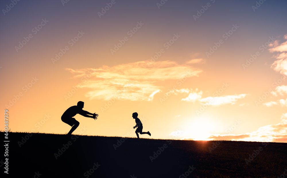 Little boy running to give his father a hug. Father son relationships. Little boy running to give his father a hug. Father son relationships.