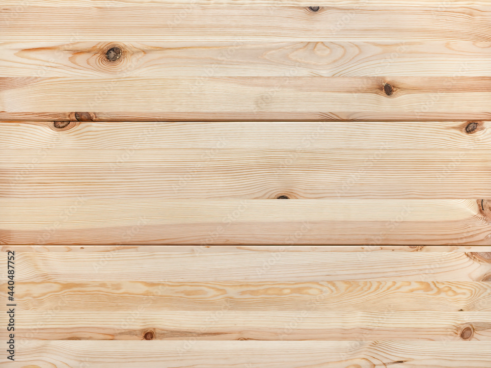 Texture of new wooden planks with brown knots. Background of horizontal pine timber boards of natural color. Smooth surface of wood rustic table top. Full frame design element. Texture of new wooden planks with brown knots. Background of horizontal pine timber boards of natural color. Smooth surface of wood rustic table top. Full frame design element.