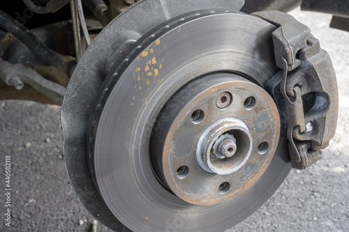 Closeup detail of the wheel assembly on a modern automobile.
