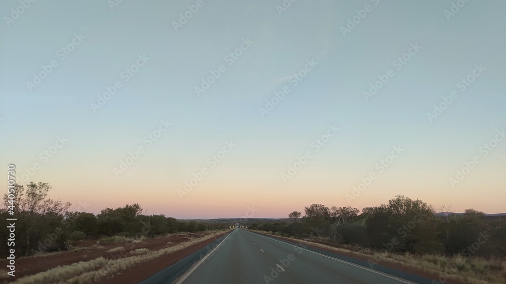 Australian sunset on the national highway, near Newman, Western Australia