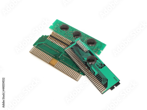 Appearance of old nintendo game cassette after removing the case. Circuit board from old nintendo game console