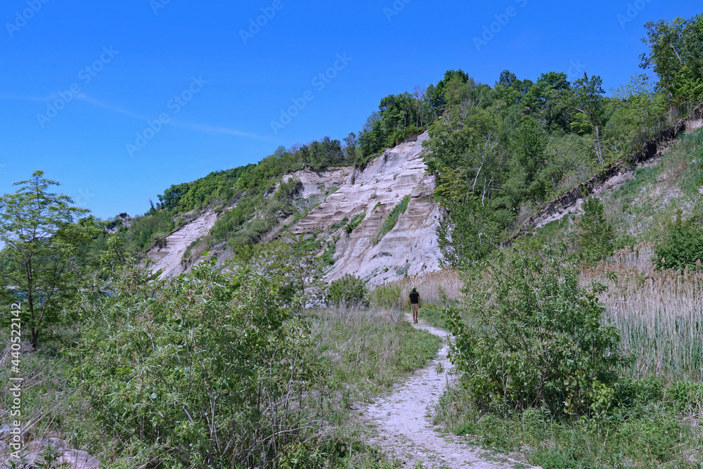 Hiking trail beneath the Scarborough Bluffs sand cliffs beside Lake Ontario near Toronto