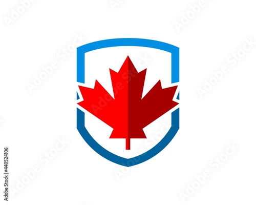 Simple shield with red maple leaf inside