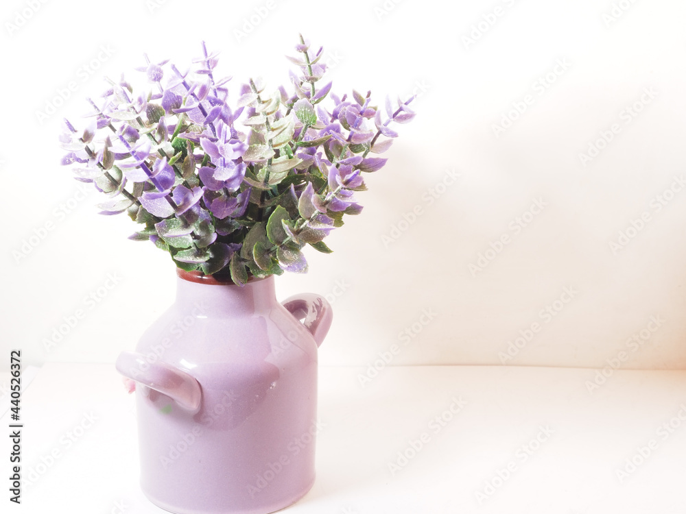 Picture of artificial plastic flower on a ceramic vase Picture of artificial plastic flower on a ceramic vase
