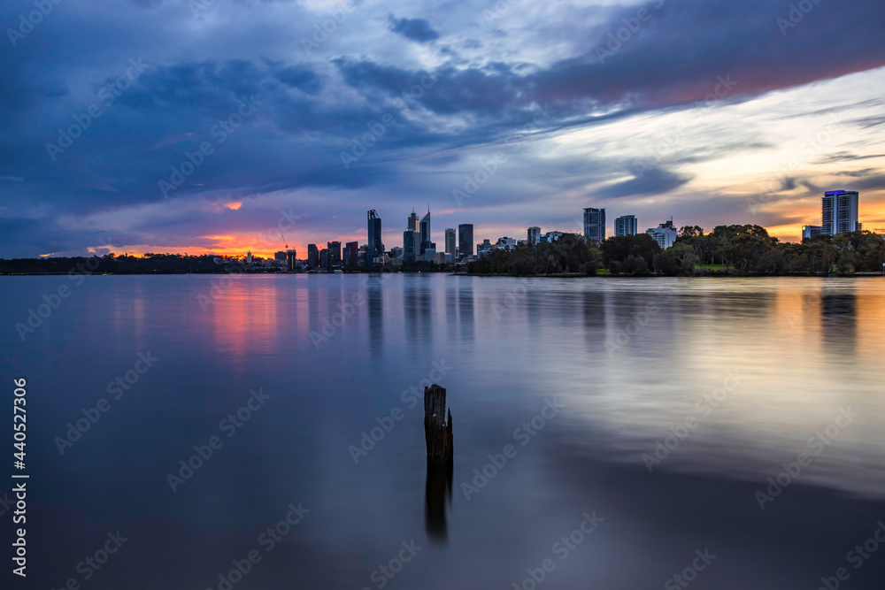 Sunset at Swan River, Perth, with cityscape in background