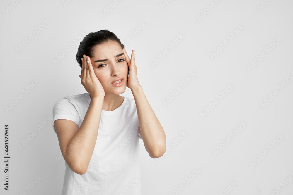 woman with headache holding her head migraine treatment health problem woman with headache holding her head migraine treatment health problem