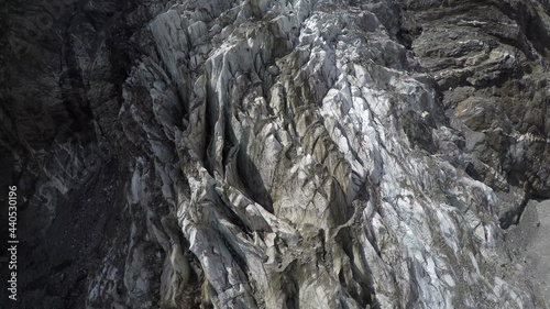 Caucasus, Ossetia. Tsey gorge. Cracks in the icefall. 