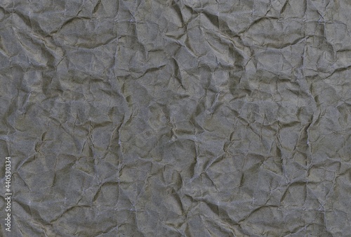 Wrinkled Paper gray background, close-up facade
