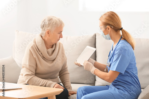 Doctor with tablet computer...