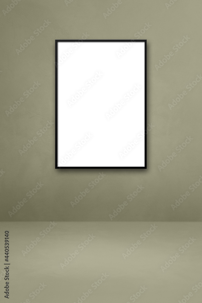Black picture frame hanging on a grey wall Black picture frame hanging on a grey wall