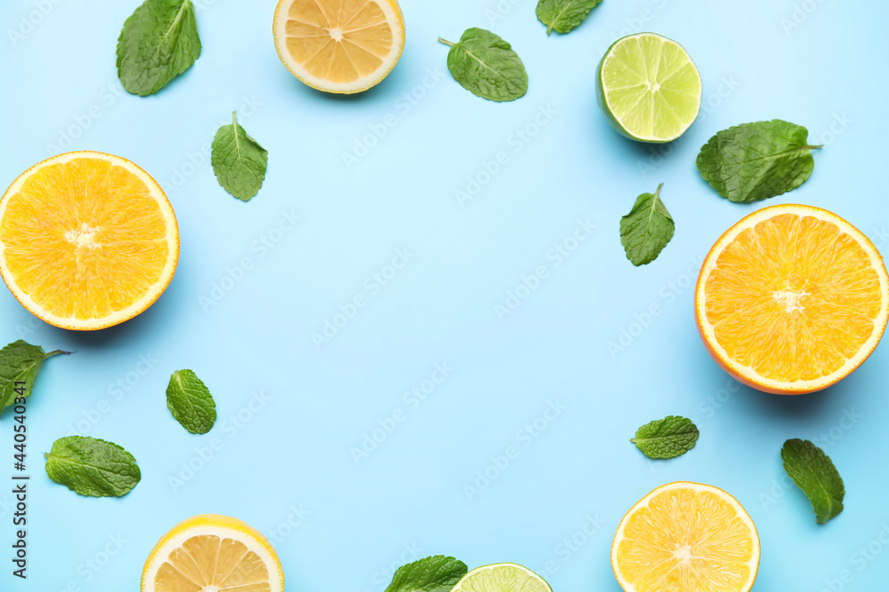 Frame made of healthy citrus fruits on color background Frame made of healthy citrus fruits on color background