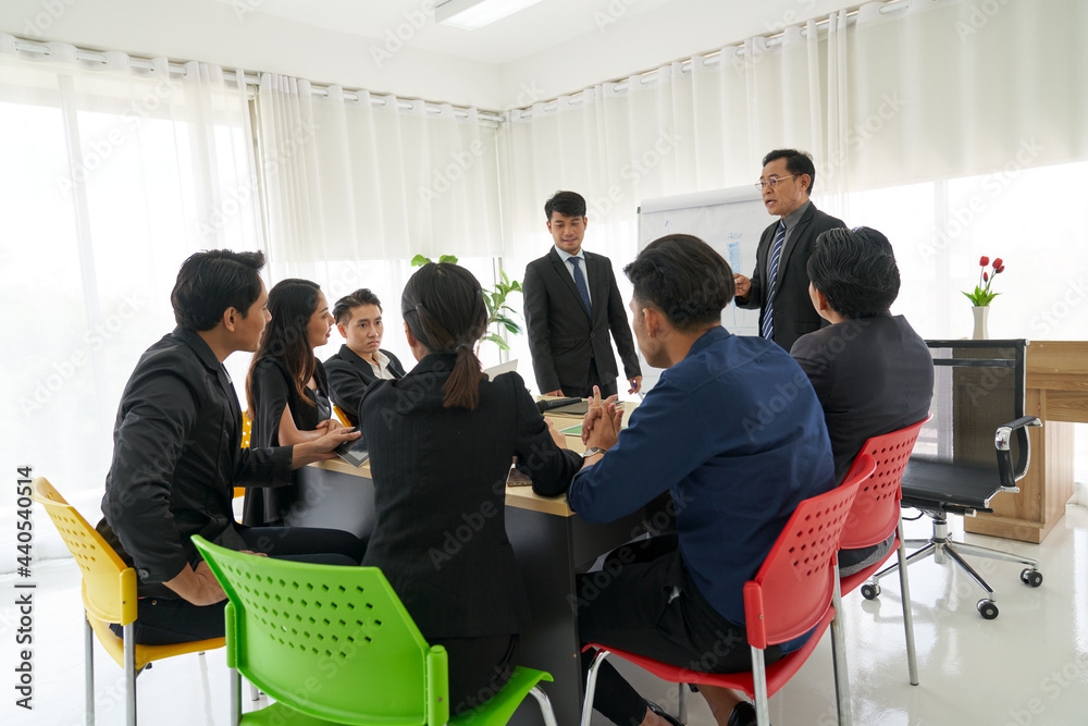 Group of asian business sales team with manager are meeting for create strategic plan Group of asian business sales team with manager are meeting for create strategic plan