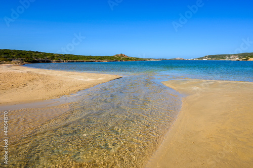 Stefano Beach with a strip of sand that connects Island of Paros with the islet of Oikonomou. This secluded beach is located between Naoussa and Santa Maria. Cyclades, Greece