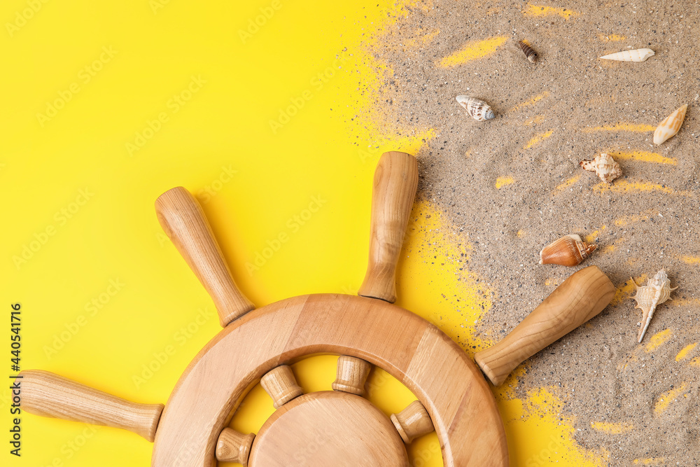Helm, sand and sea shells on color background Helm, sand and sea shells on color background