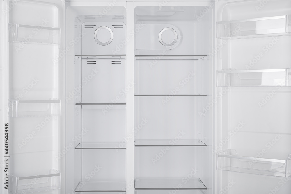 Fototapeta premium Refrigerator Isolated on White Background. Modern Kitchen and Domestic Major Appliances