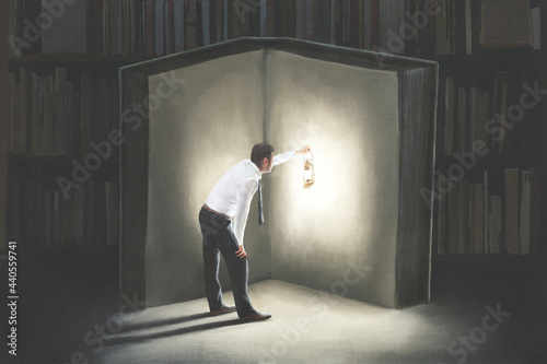 Foto Illustration of man with lamp reading a big book in the night, surreal concept