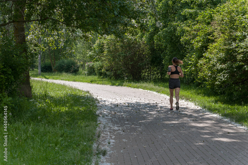 Fototapeta premium Running through the park