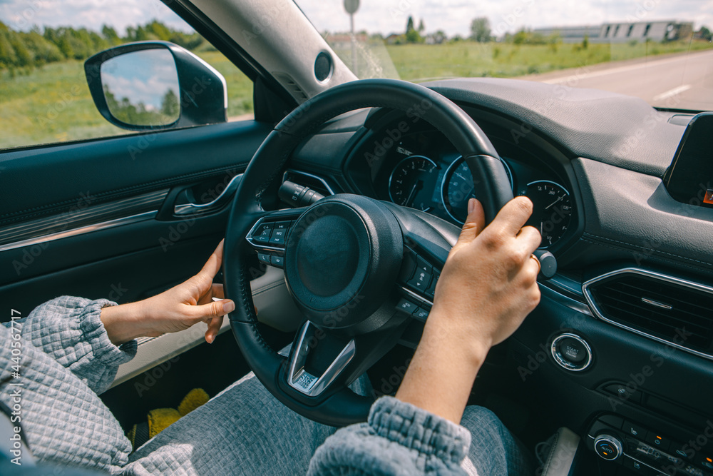 woman driving car view from inside no face