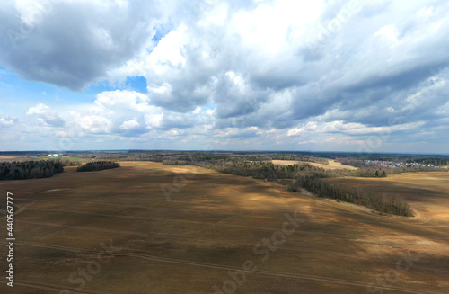 Aerial view of agricultural landscape with fields in spring season