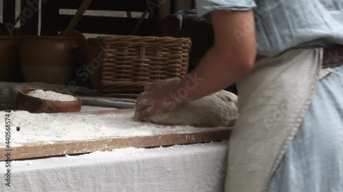 Baking bread old style on the event medieval week in the city of visby on the island Gotland in Sweden photo