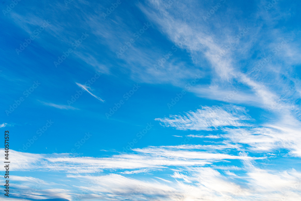 Blue sky with white beautiful clouds as an abstract background. In high resolution. Blue sky with white beautiful clouds as an abstract background. In high resolution.