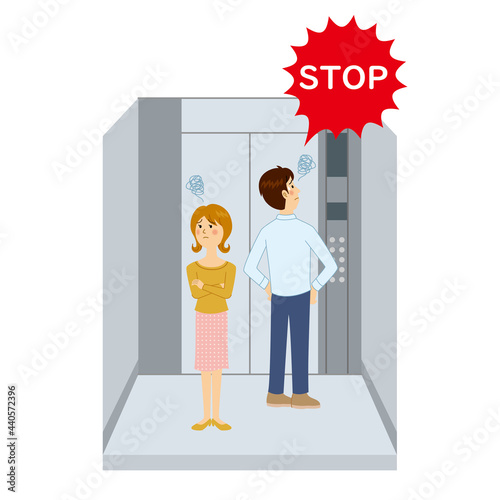エレベーターに閉じ込められる男女