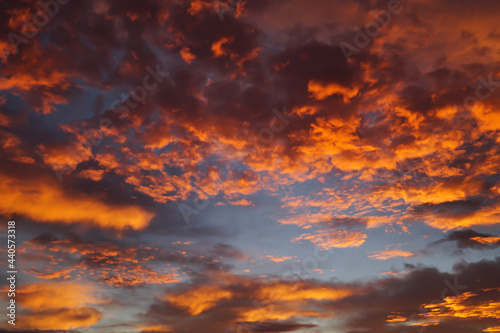 scenic orange golden cloudscape at sunrise abstract background 